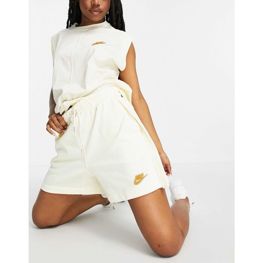 Nike mid rise fleece shorts in off white size Small